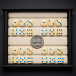 Set of dice with blue dots on a black background