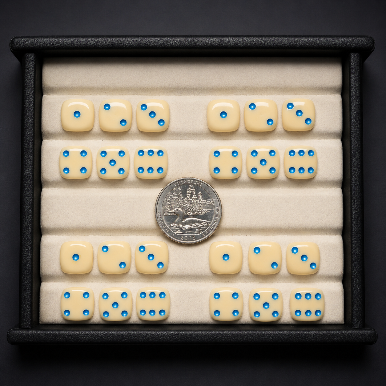 Set of dice with blue dots on a black background