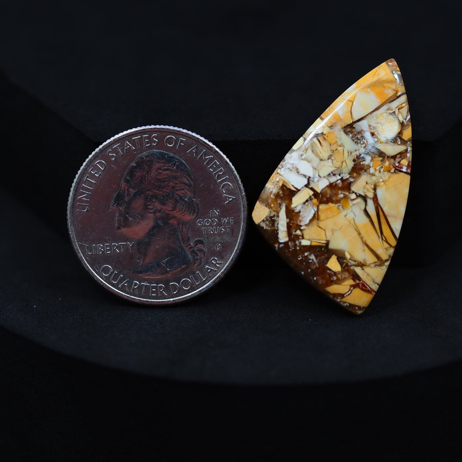 Natural Brecciated Mookaite jasper cabochon 35x20mm trillion front view golden brown cream brecciation Pedra Gems