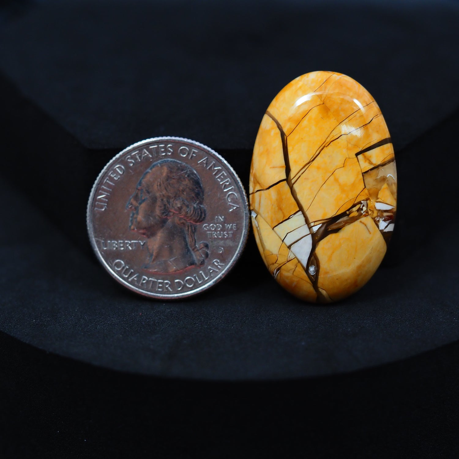 Natural Brecciated Mookaite jasper cabochon 34x22mm oval front view golden brown cream brecciation Pedra Gems