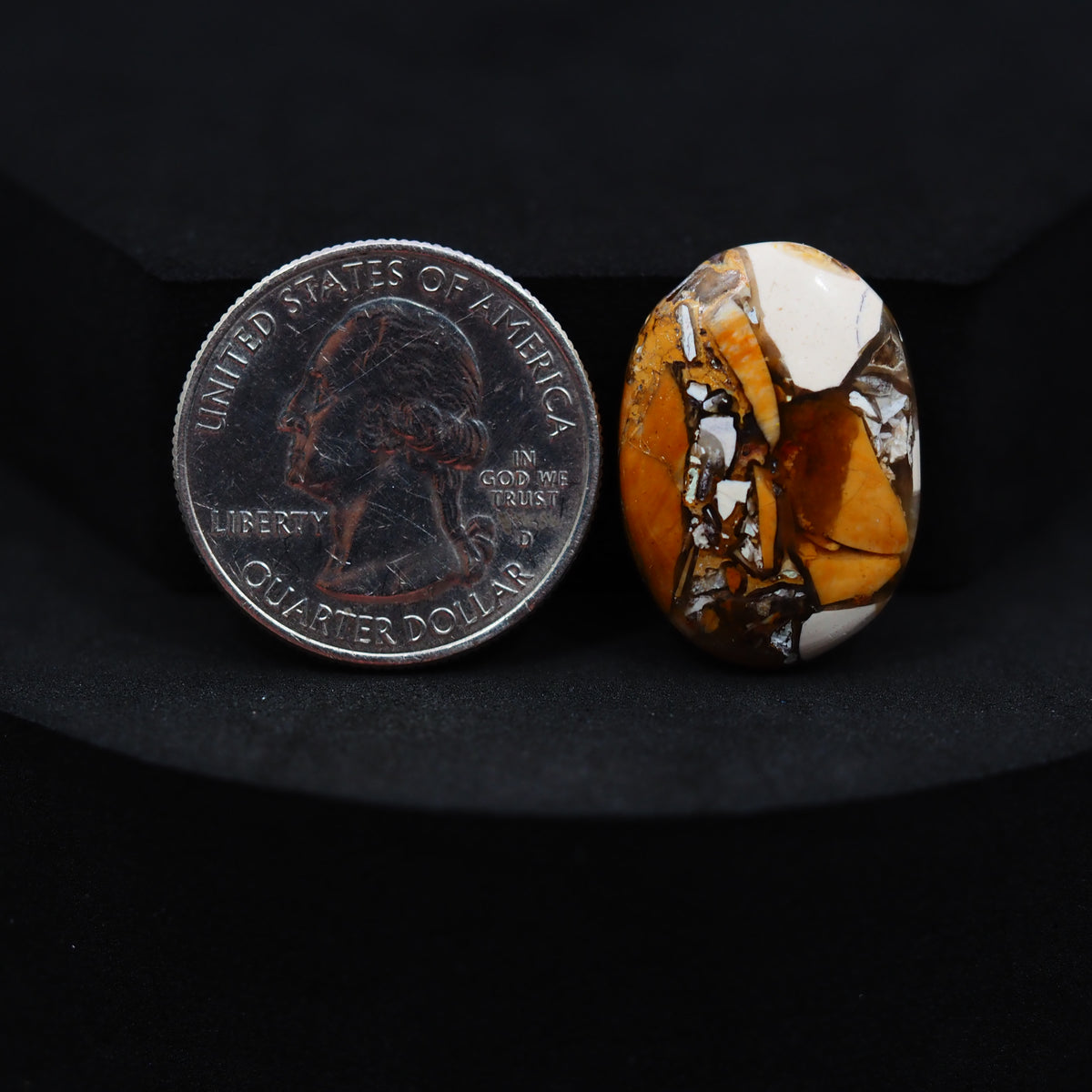 Natural Brecciated Mookaite jasper cabochon 24x17mm oval front view golden brown cream brecciation Pedra Gems