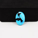 Buffalo Oval Cabochon 16x11mm 6.5ct - Blue with Black Inclusions - Pedra Gems