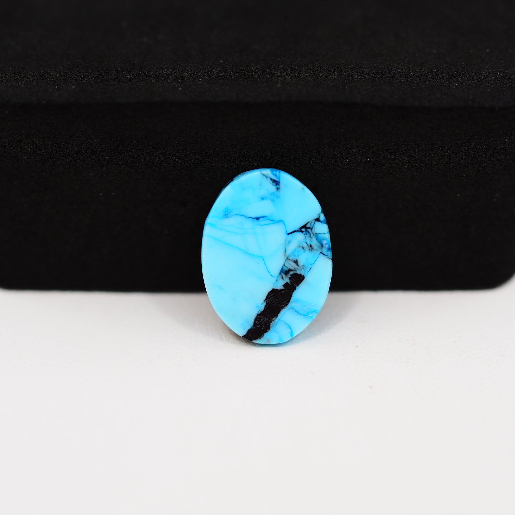 Buffalo Oval Cabochon 15x11mm 5.5ct - Black Top Blue Base - Pedra Gems