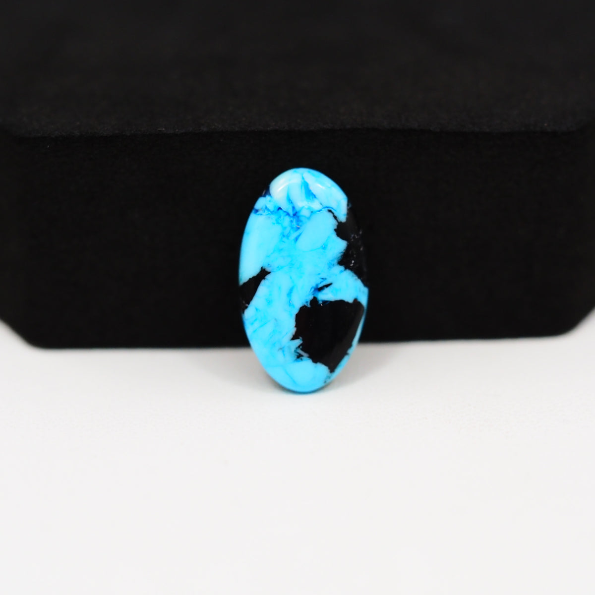 Buffalo Oval Cabochon 18x11mm 4.5ct - Blue with Black Patches - Pedra Gems