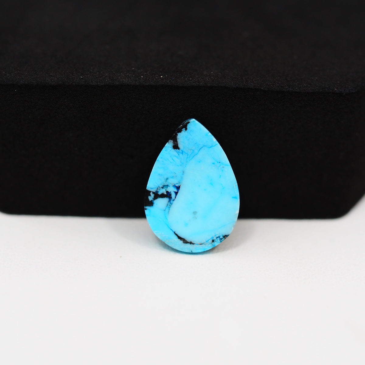 Buffalo Pear Cabochon 17x12mm 6.5ct - Black Top Blue Base - Pedra Gems