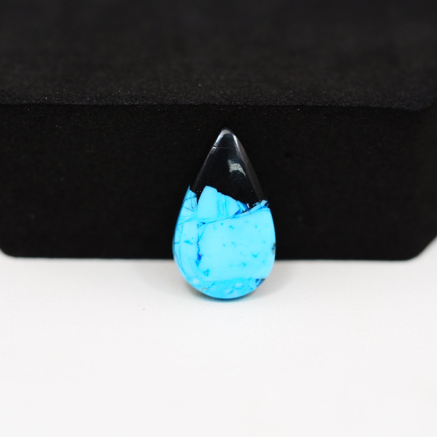 Buffalo Pear Cabochon 19x11mm 5ct - Black Top Blue Speckled Base - Pedra Gems