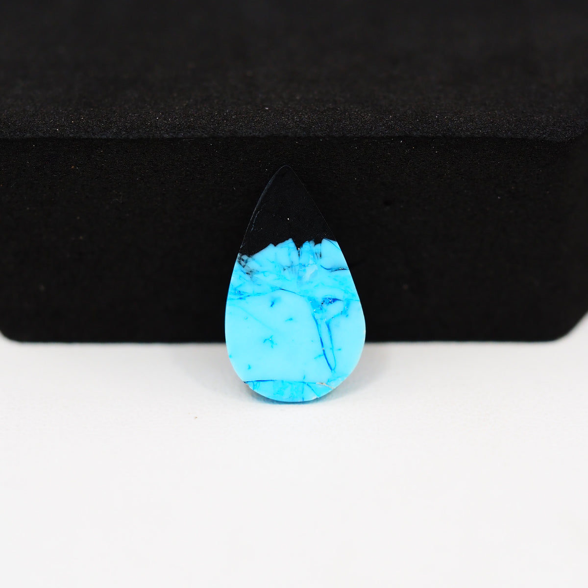 Buffalo Pear Cabochon 19x11mm 5ct - Black Top Blue Speckled Base - Pedra Gems