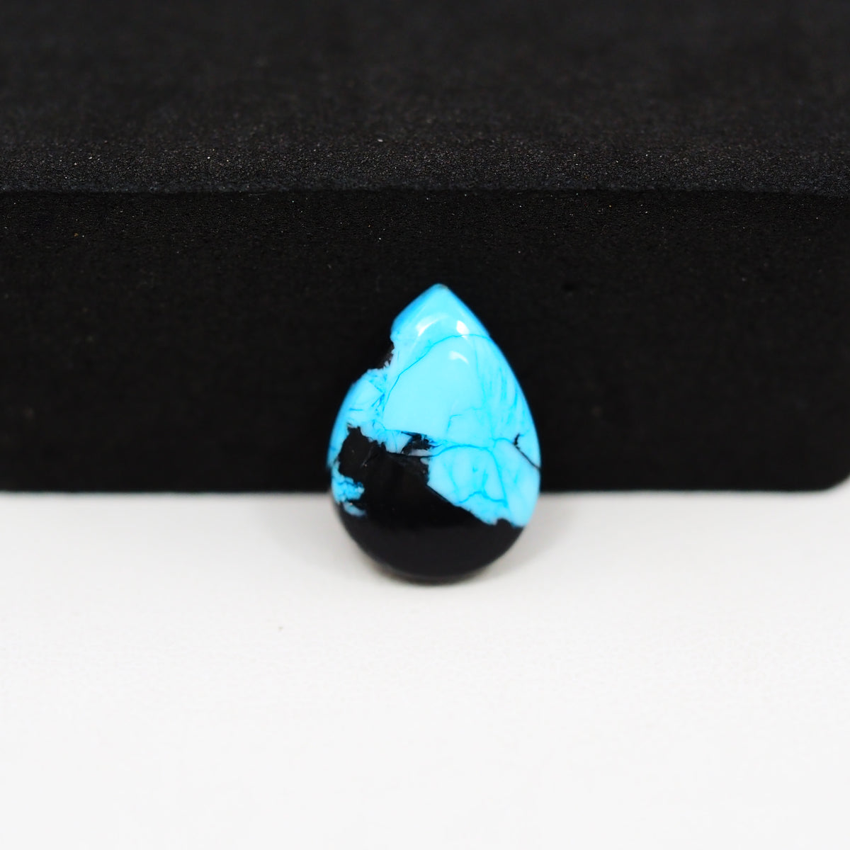 Buffalo Pear Cabochon 15x11mm 4.5ct - Blue Top Black Base - Pedra Gems