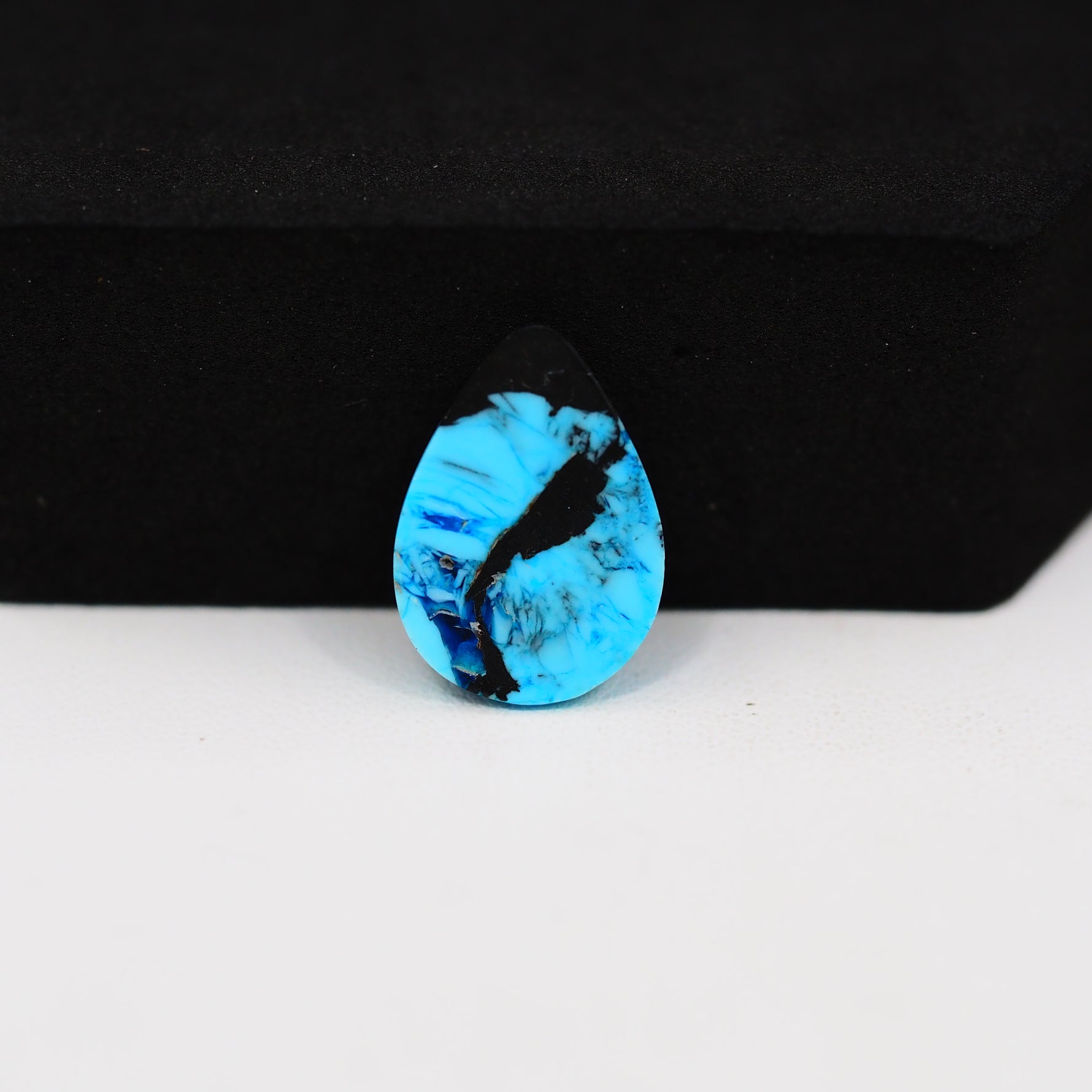 Buffalo Pear Cabochon 16x12mm 5.5ct - Blue with Black Tip - Pedra Gems