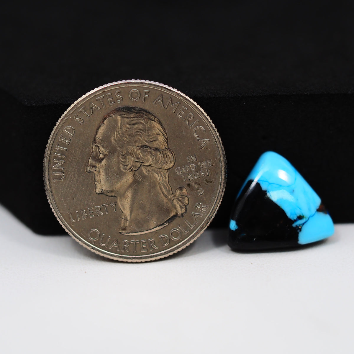 Buffalo Triangular Cabochon 12x14mm 4ct - Blue with Black Base - Pedra Gems