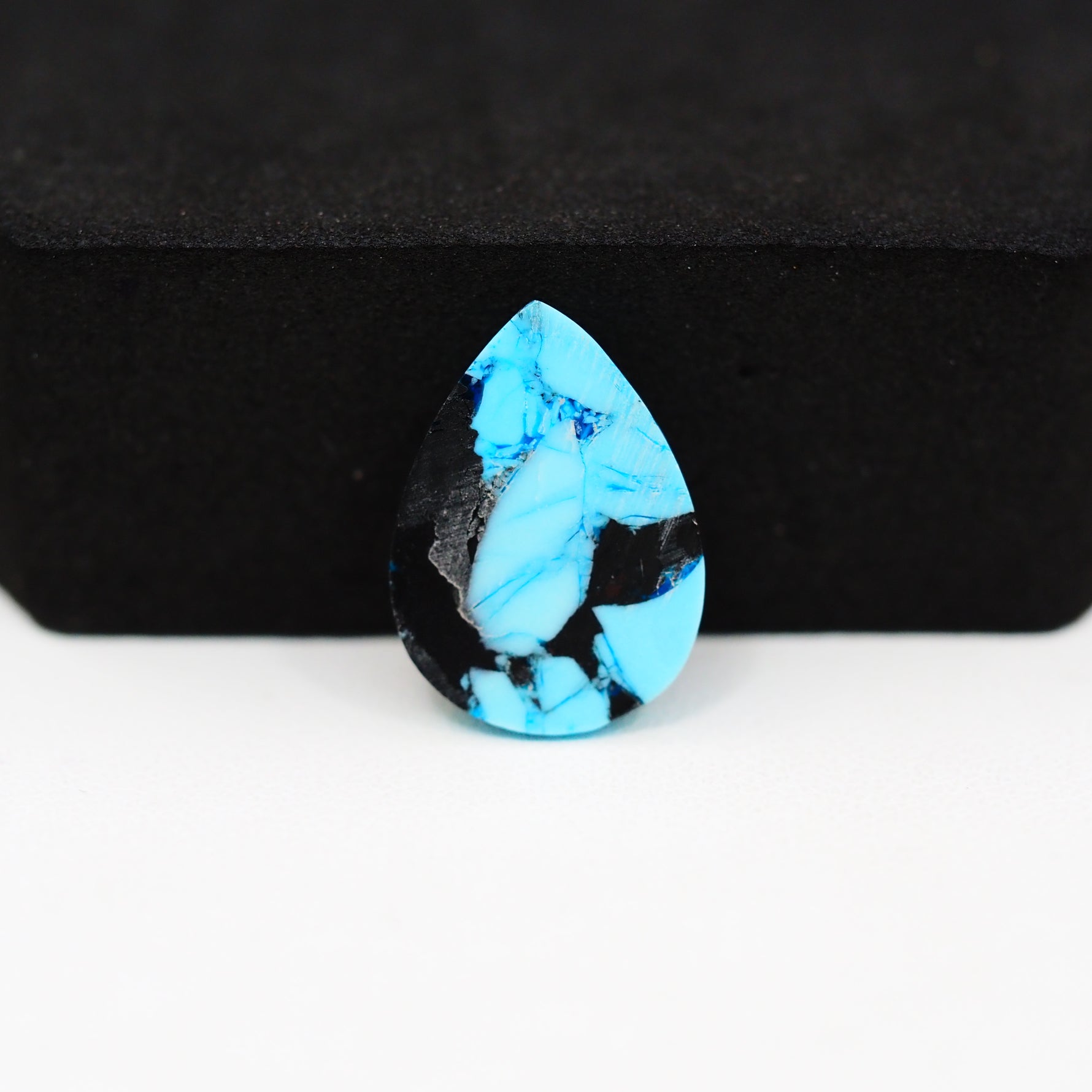 Buffalo Pear Cabochon 18x14mm 7.5ct - Blue with Black Patch - Pedra Gems