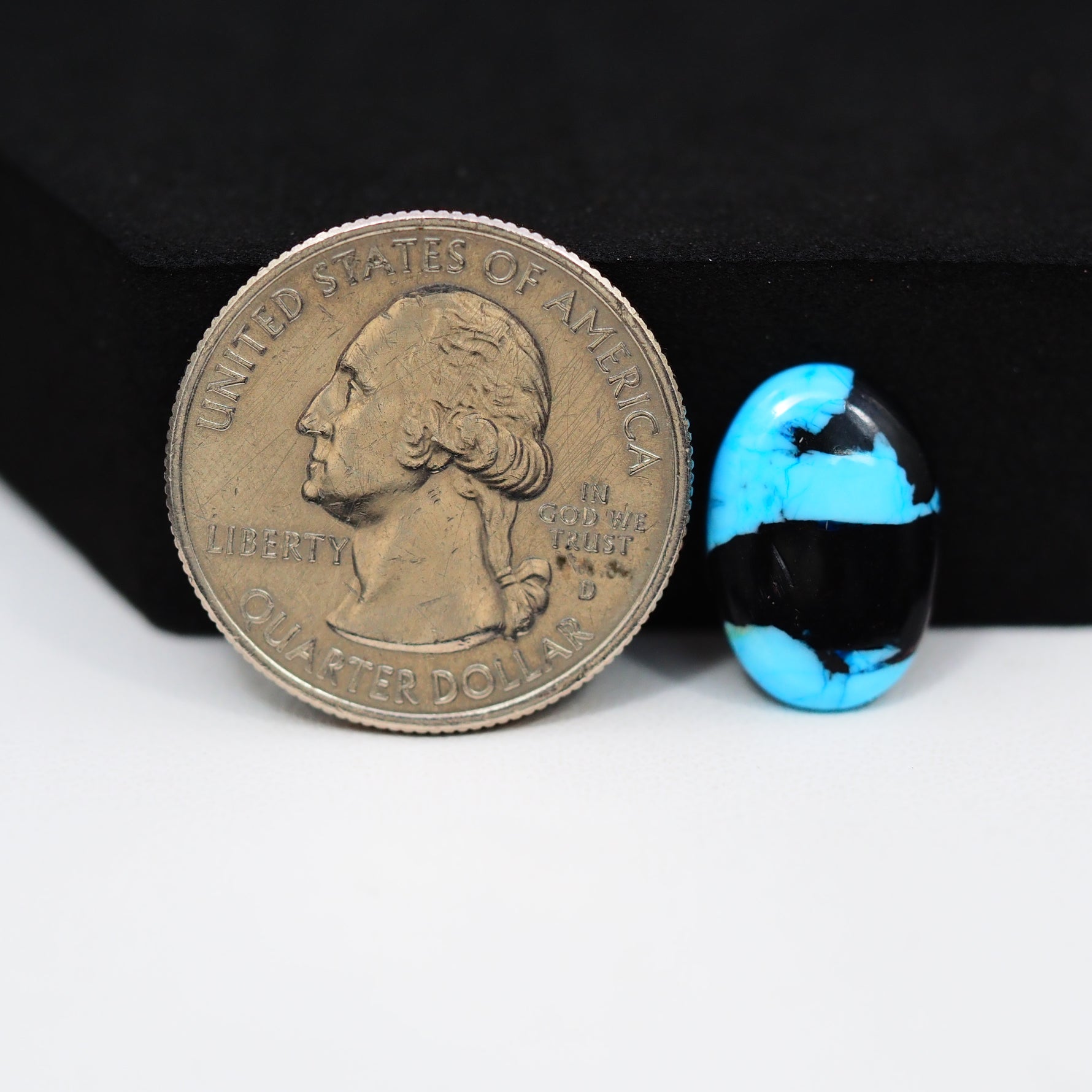 Buffalo Oval Cabochon 16x11mm 4.5ct - Black with Blue Band - Pedra Gems