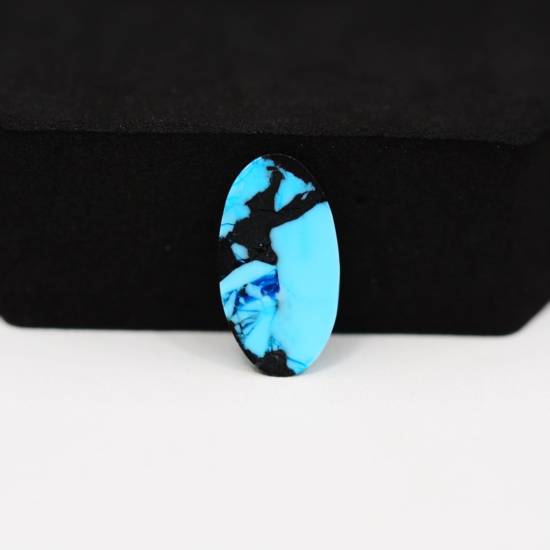 Buffalo Pear Cabochon 19x11mm 5.5ct - Blue with Black Base - Pedra Gems