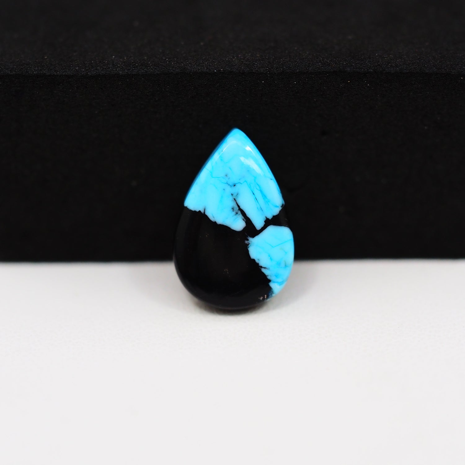 Buffalo Pear Cabochon 16x11mm 4.5ct - Blue with Black Base - Pedra Gems