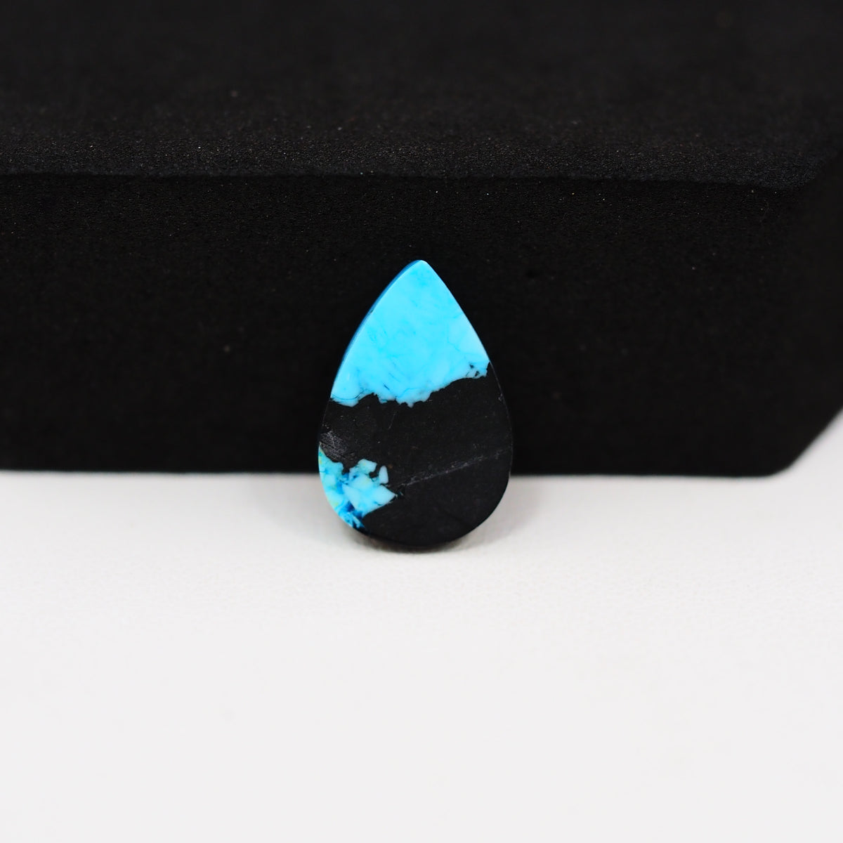Buffalo Pear Cabochon 16x11mm 4.5ct - Blue with Black Base - Pedra Gems