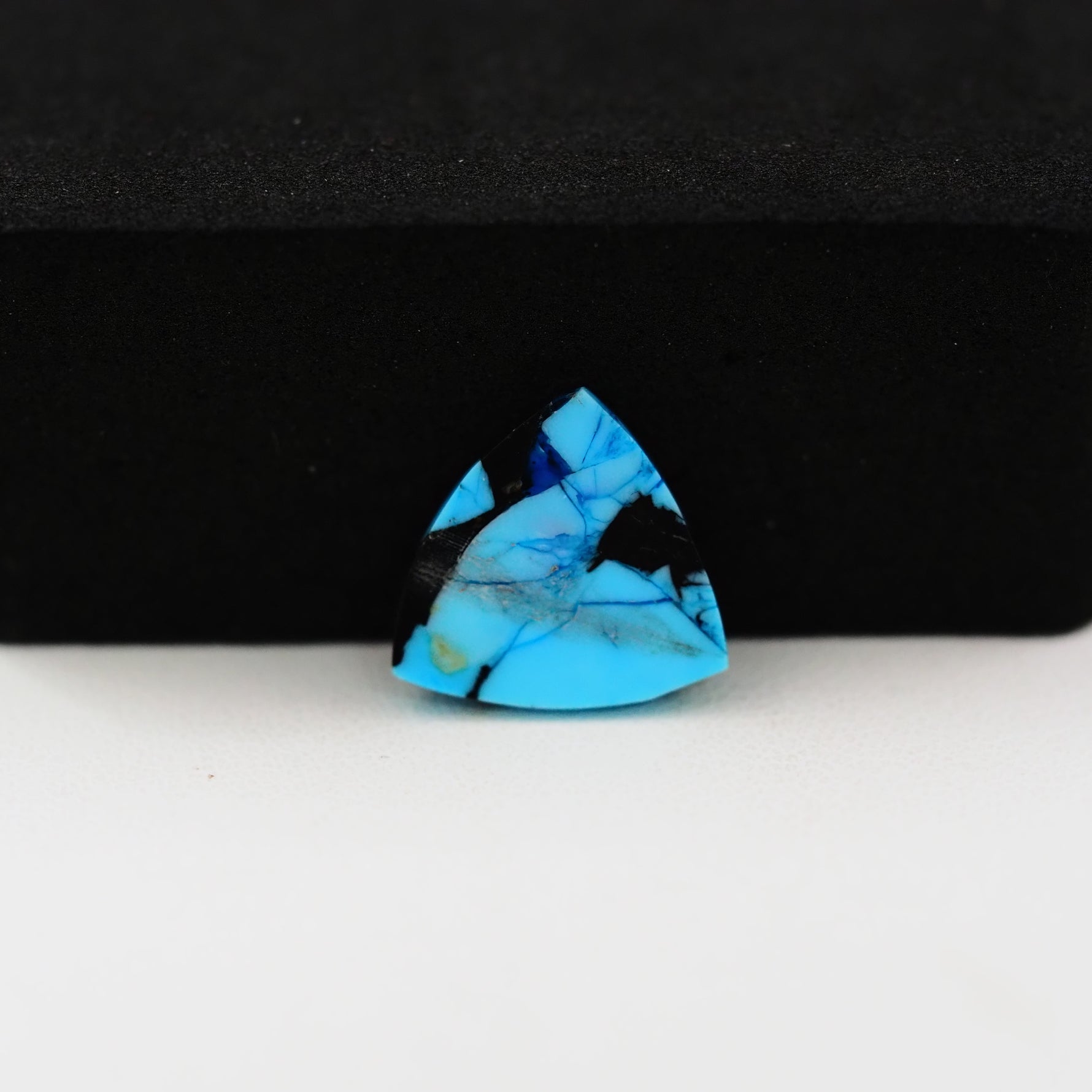 Buffalo Triangular Cabochon 13x13mm 4ct - Blue with Black Base - Pedra Gems
