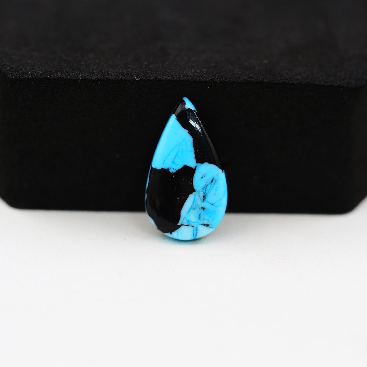 Buffalo Pear Cabochon 18x10mm 5ct - Black Top Blue Base - Pedra Gems