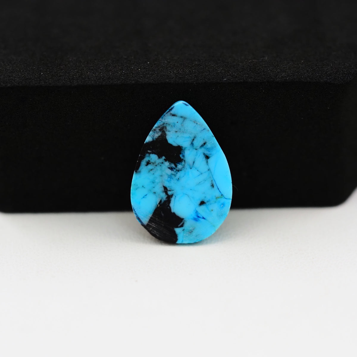 Buffalo Pear Cabochon 18x13mm 7.5ct - Black Top Blue Base - Pedra Gems