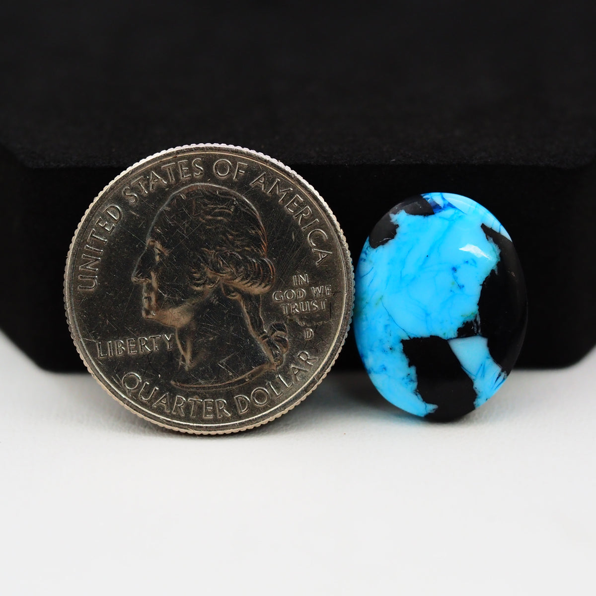 Buffalo Pear Cabochon 19x14mm 9.5ct - Black Top Blue Base - Pedra Gems