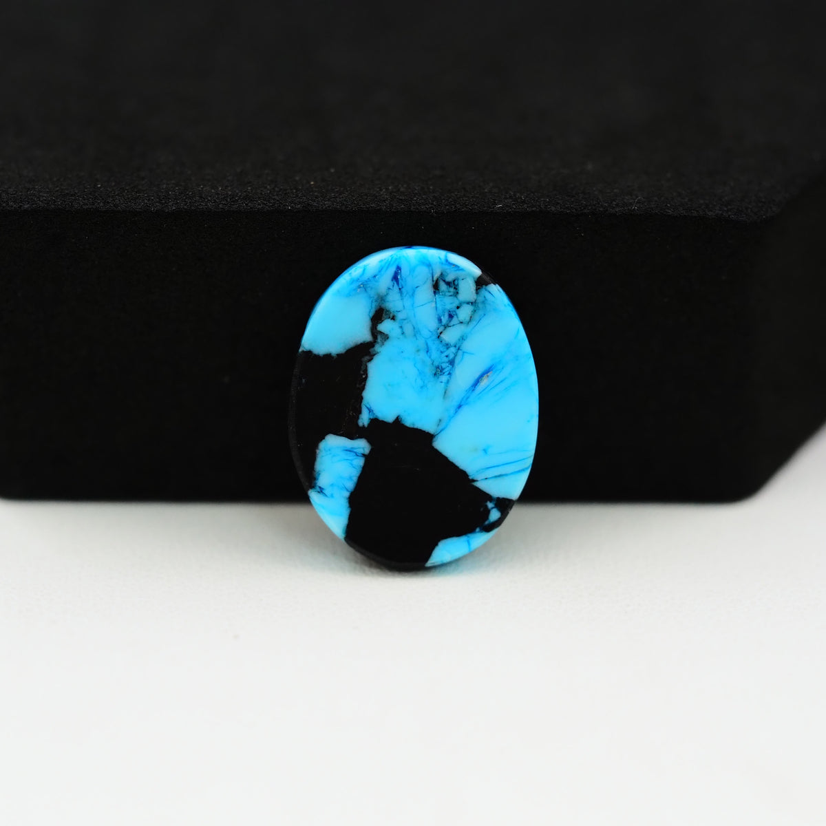 Buffalo Pear Cabochon 19x14mm 9.5ct - Black Top Blue Base - Pedra Gems