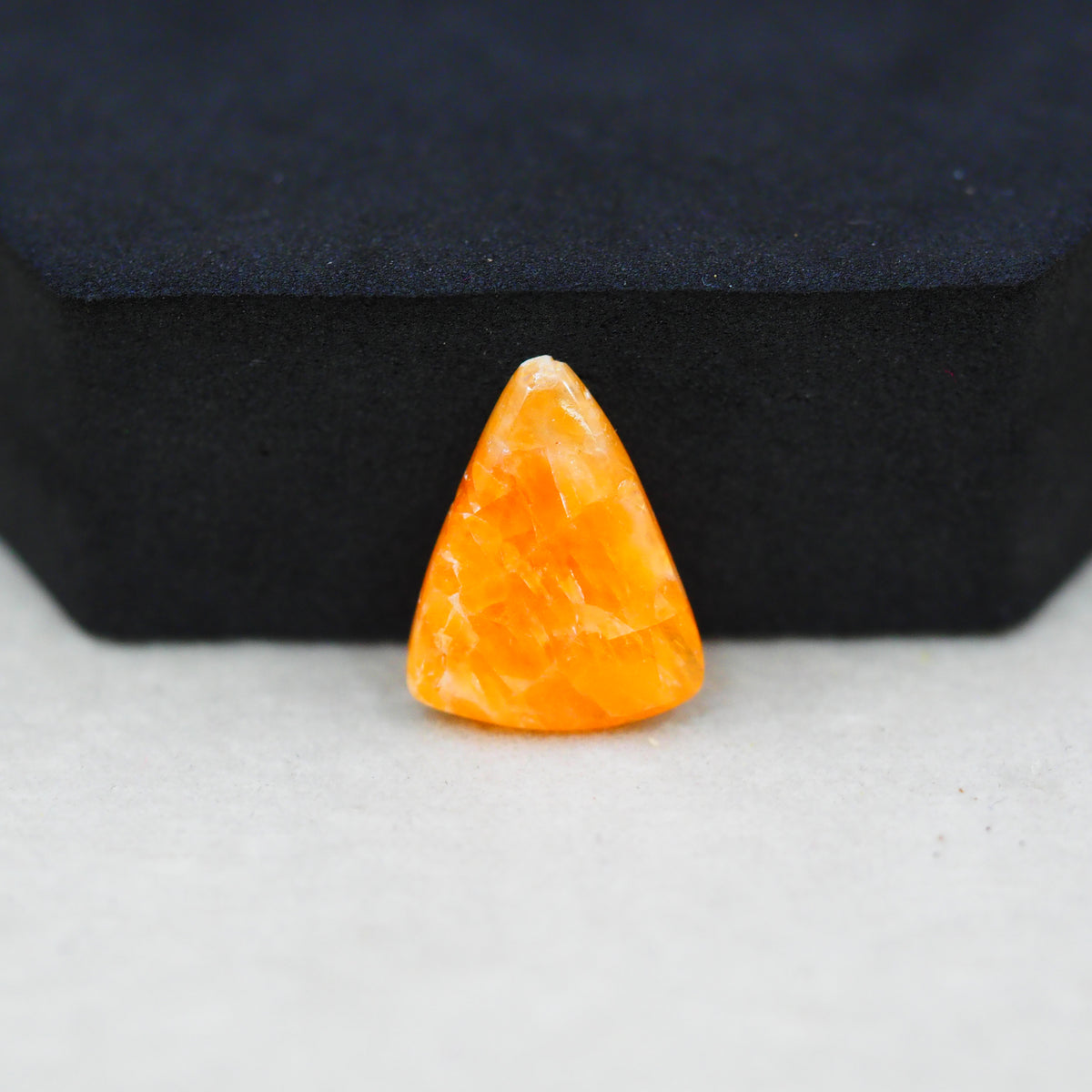 Natural Orange Calcite Trillion Cabochon 18x14mm 6ct - warm honey-orange - Pedra Gems.