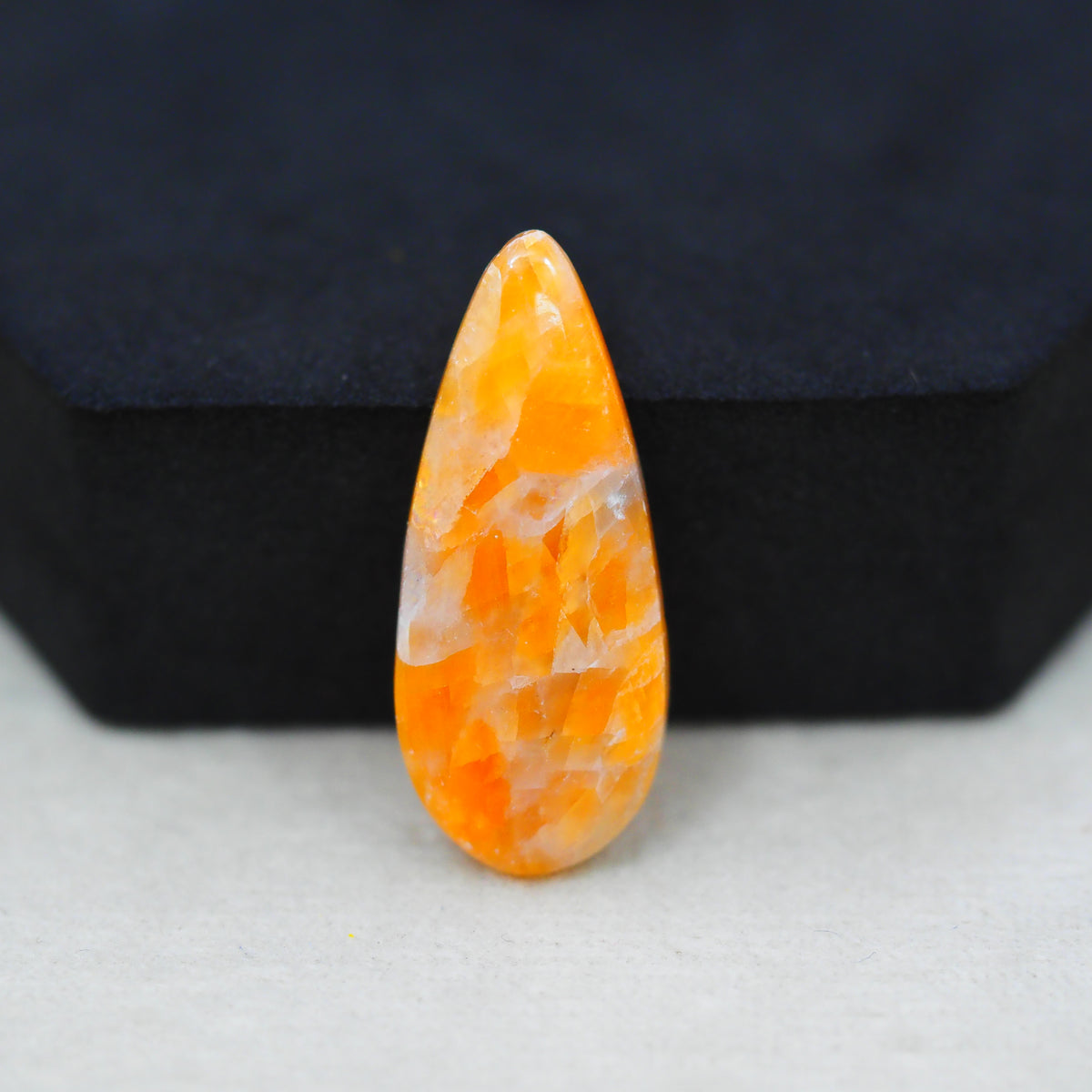 Natural Orange Calcite Pear Cabochon 31x13mm 16ct - warm honey-orange - Pedra Gems.