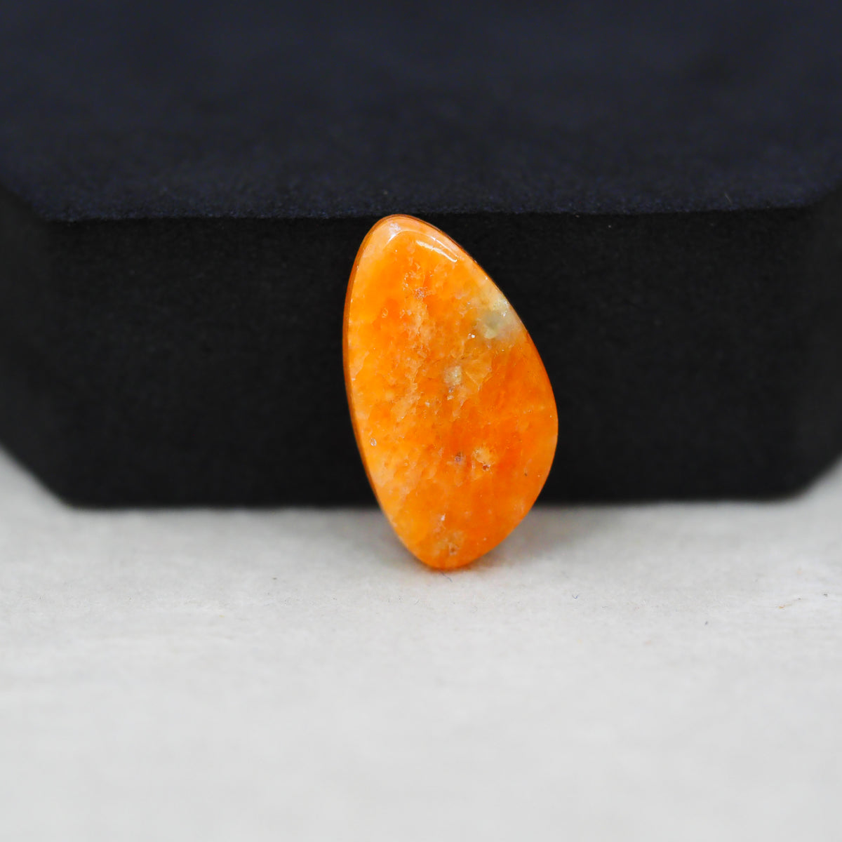 Natural Orange Calcite Trillion Cabochon 22x12mm 9.5ct - warm honey-orange - Pedra Gems.