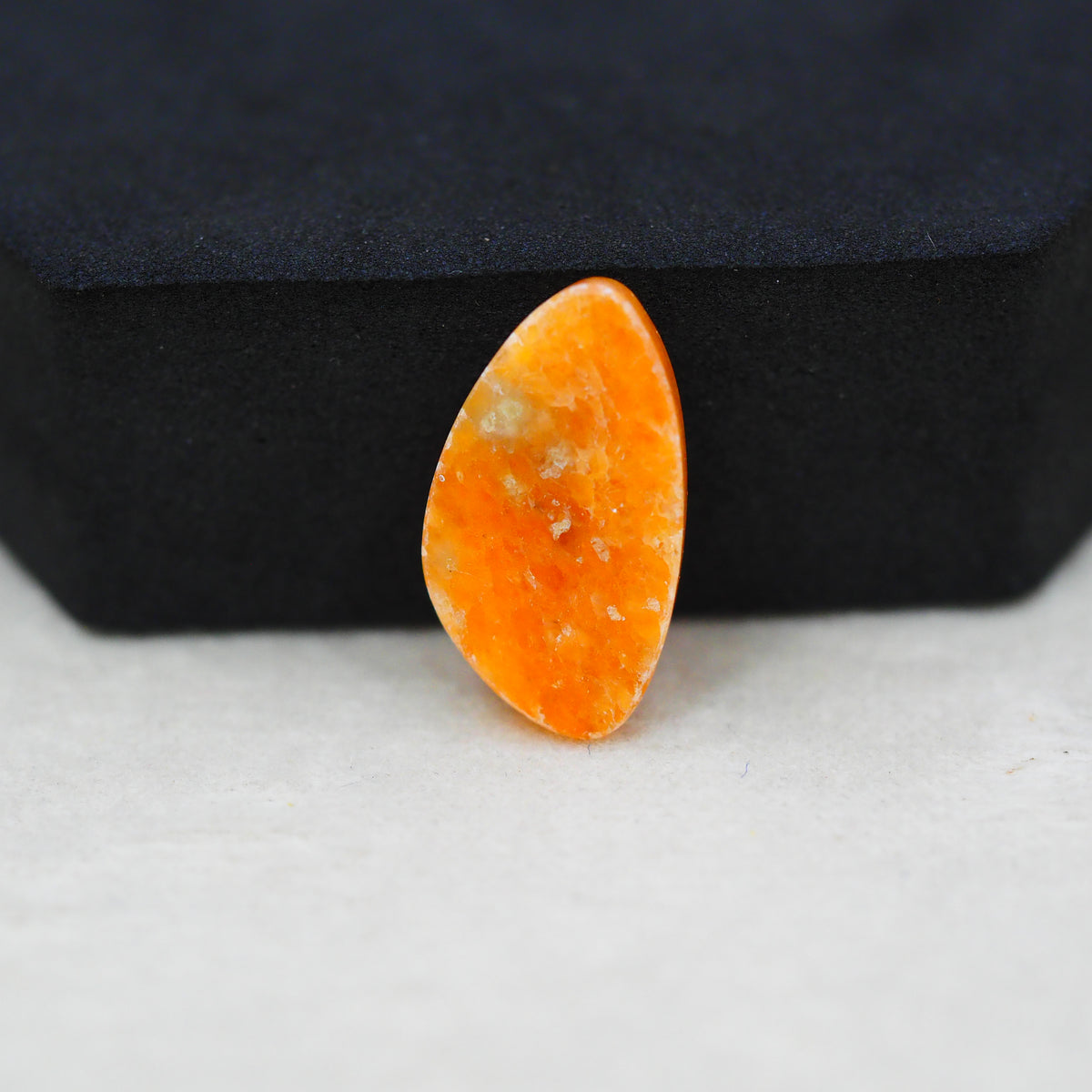 Natural Orange Calcite Trillion Cabochon 22x12mm 9.5ct - warm honey-orange - Pedra Gems.