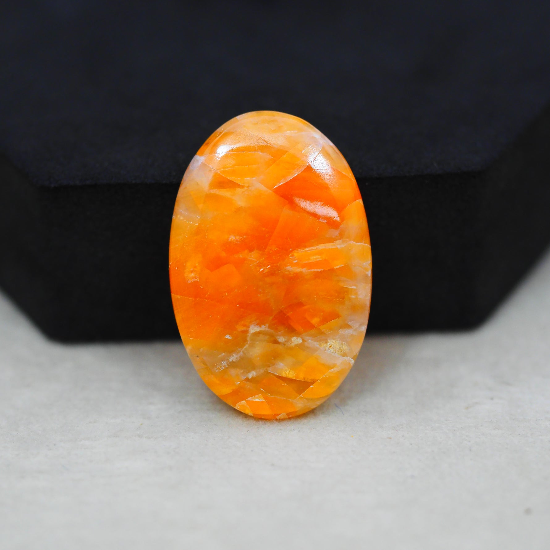 Natural Orange Calcite Oval Cabochon 31x20mm 26.5ct - warm honey-orange - Pedra Gems.