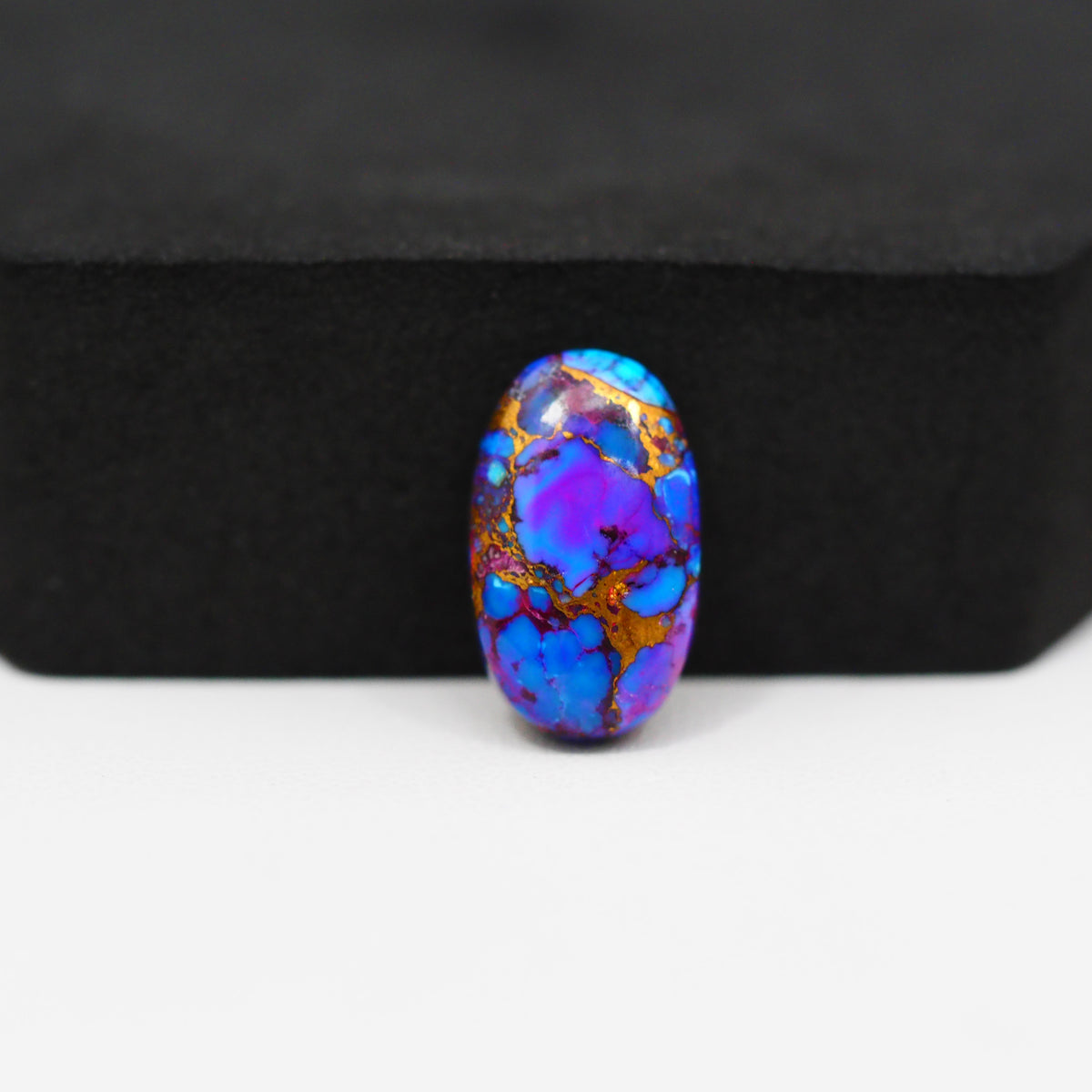 Stabilized Purple Mohave (Mojave) Turquoise Oval Cabochon 17x10x4mm 7.5ct - purple with blue Kingman turquoise nuggets and bronze veining - Pedra Gems.