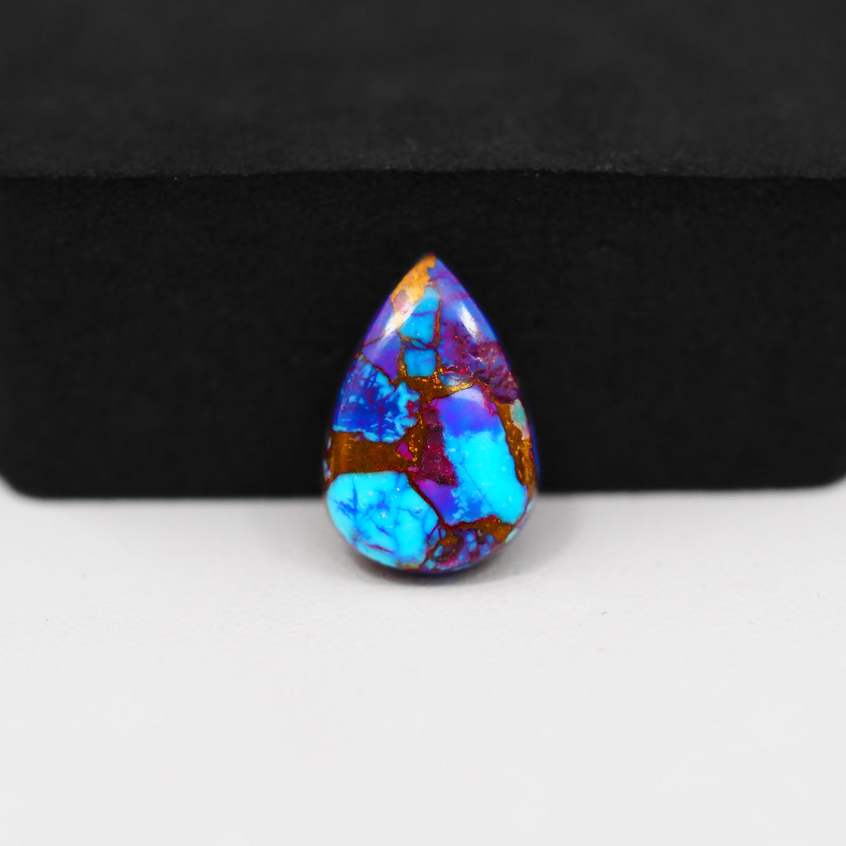 Stabilized Purple Mohave (Mojave) Turquoise Pear Cabochon 17x12x4mm 7.5ct - purple with blue Kingman turquoise nuggets and bronze veining - Pedra Gems.