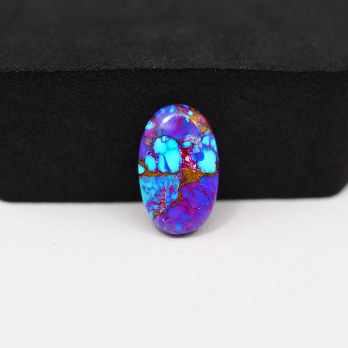 Stabilized Purple Mohave (Mojave) Turquoise Oval Cabochon 17x11x3mm 5.5ct - purple with blue Kingman turquoise nuggets and bronze veining - Pedra Gems.