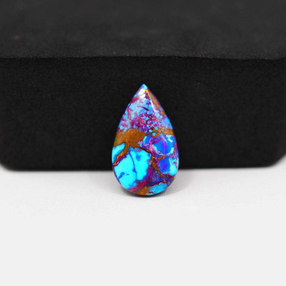 Stabilized Purple Mohave (Mojave) Turquoise Pear Cabochon 18x11x3mm 5ct - purple with blue Kingman turquoise nuggets and bronze veining - Pedra Gems.