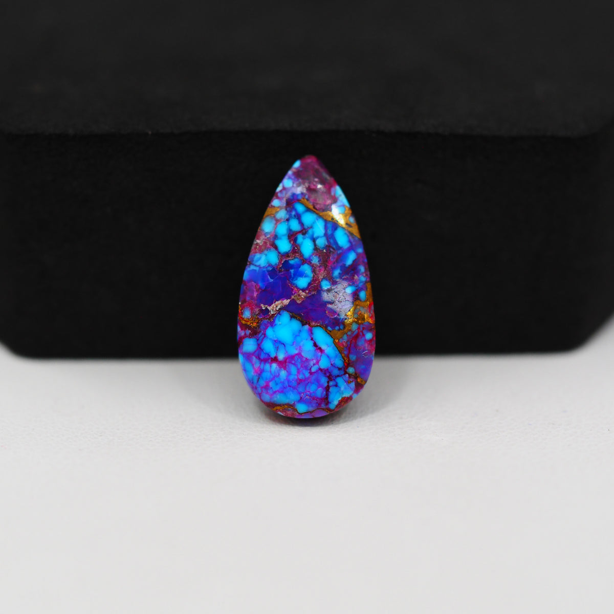 Stabilized Purple Mohave (Mojave) Turquoise Pear Cabochon 21x11x3mm 7ct - purple with blue Kingman turquoise nuggets and bronze veining - Pedra Gems.