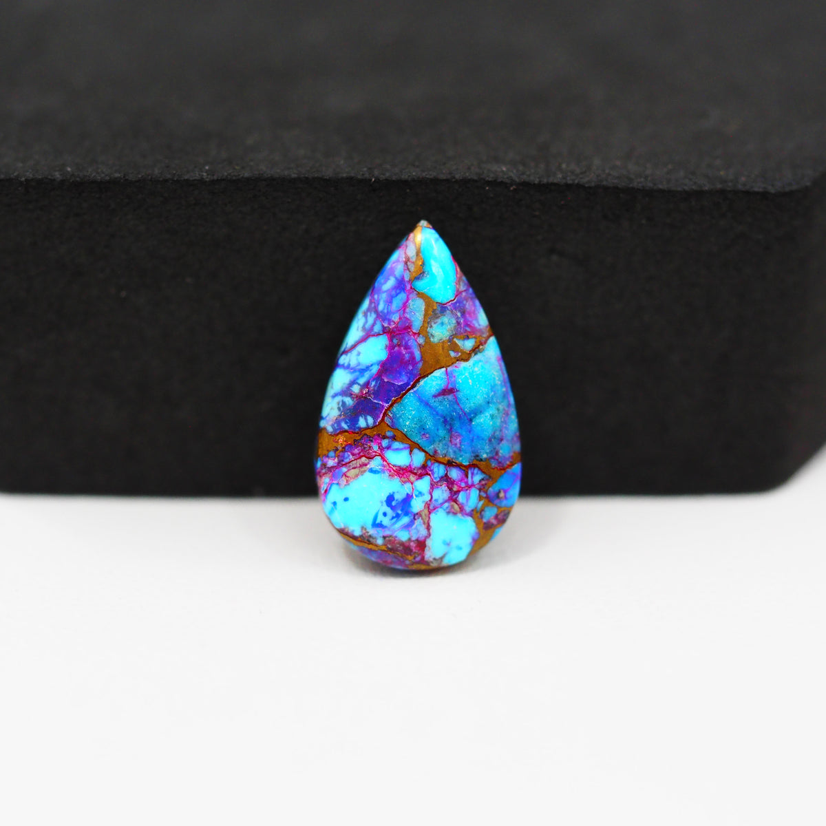 Stabilized Purple Mohave (Mojave) Turquoise Pear Cabochon 19x11x3mm 6ct - purple with blue Kingman turquoise nuggets and bronze veining - Pedra Gems.