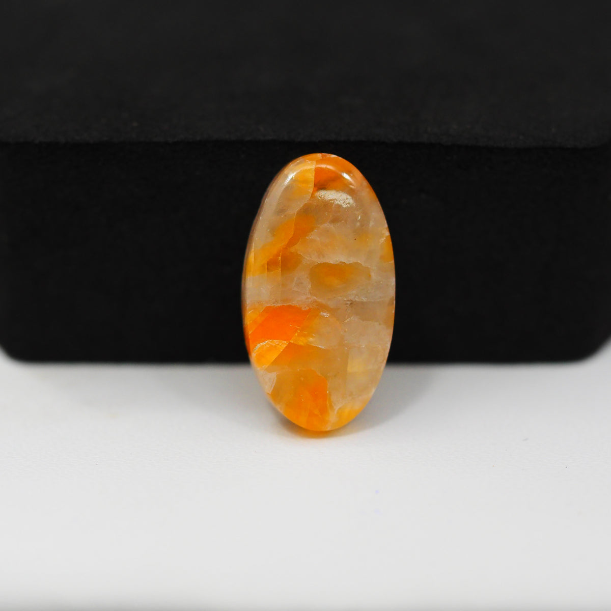 Natural Orange Calcite Oval Cabochon 21x12mm 9.5ct - warm honey-orange - Pedra Gems.