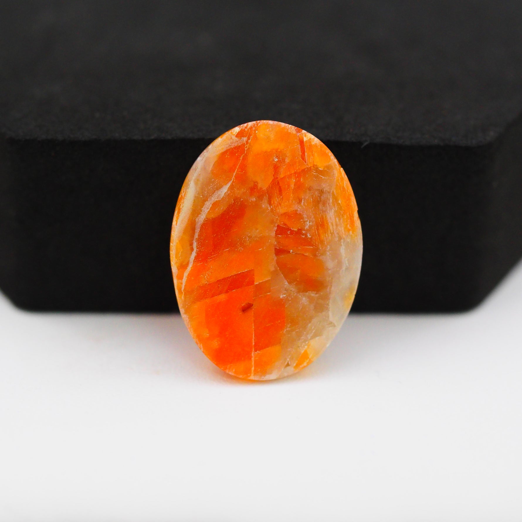 Natural Orange Calcite Oval Cabochon 25x18mm 19.5ct - warm honey-orange - Pedra Gems.