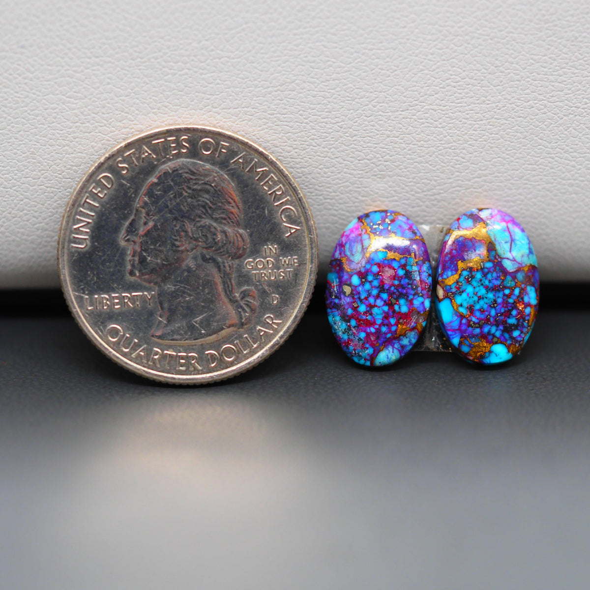 Stabilized Purple Mohave (Mojave) Turquoise oval cabochon pair 14x10x3mm 8.5ct - purple with blue Kingman turquoise nuggets - photo 1 - Pedra Gems.
