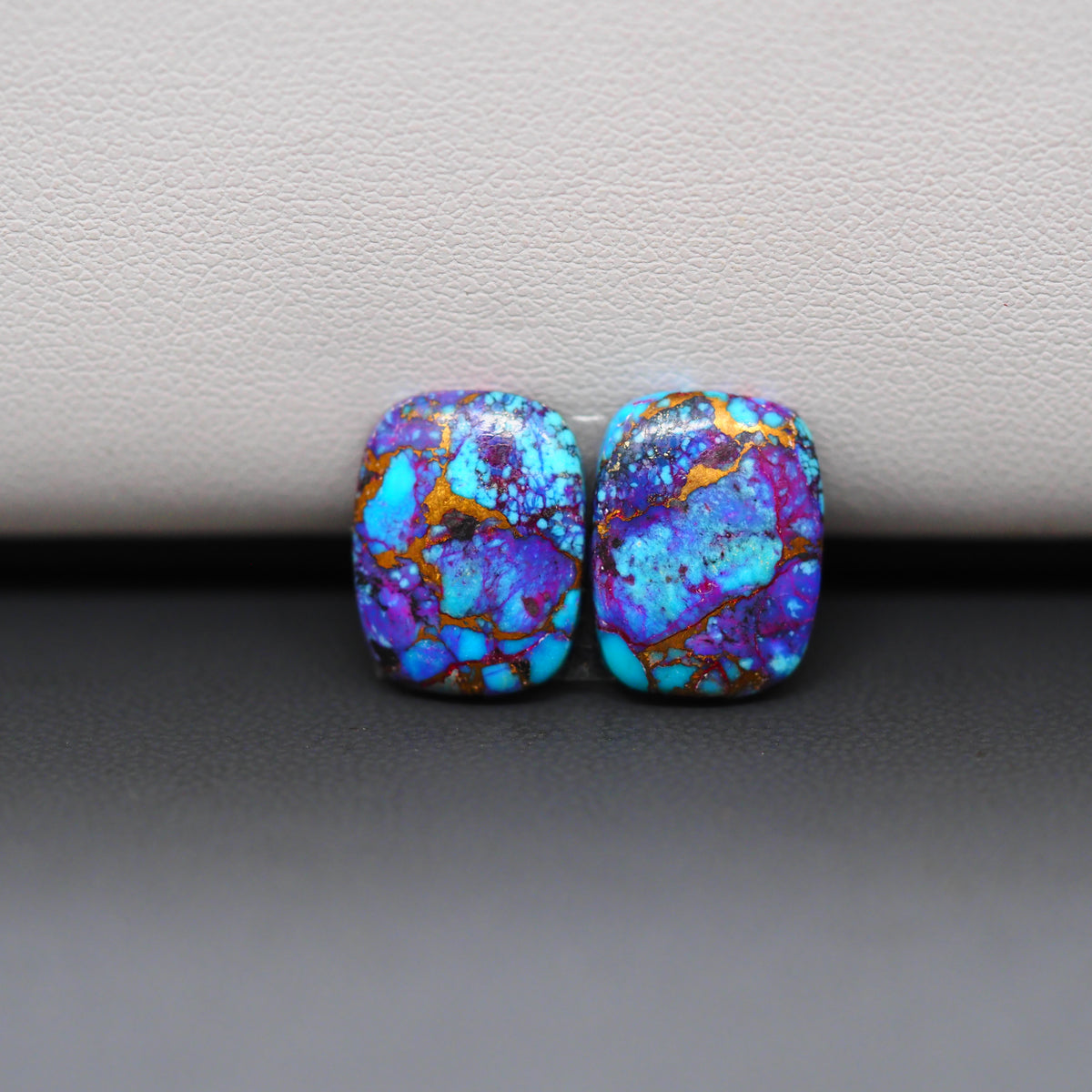 Stabilized Purple Mohave (Mojave) Turquoise cushion cabochon pair 14x11x3mm 9.5ct - purple with blue Kingman turquoise nuggets - photo 4 - Pedra Gems.