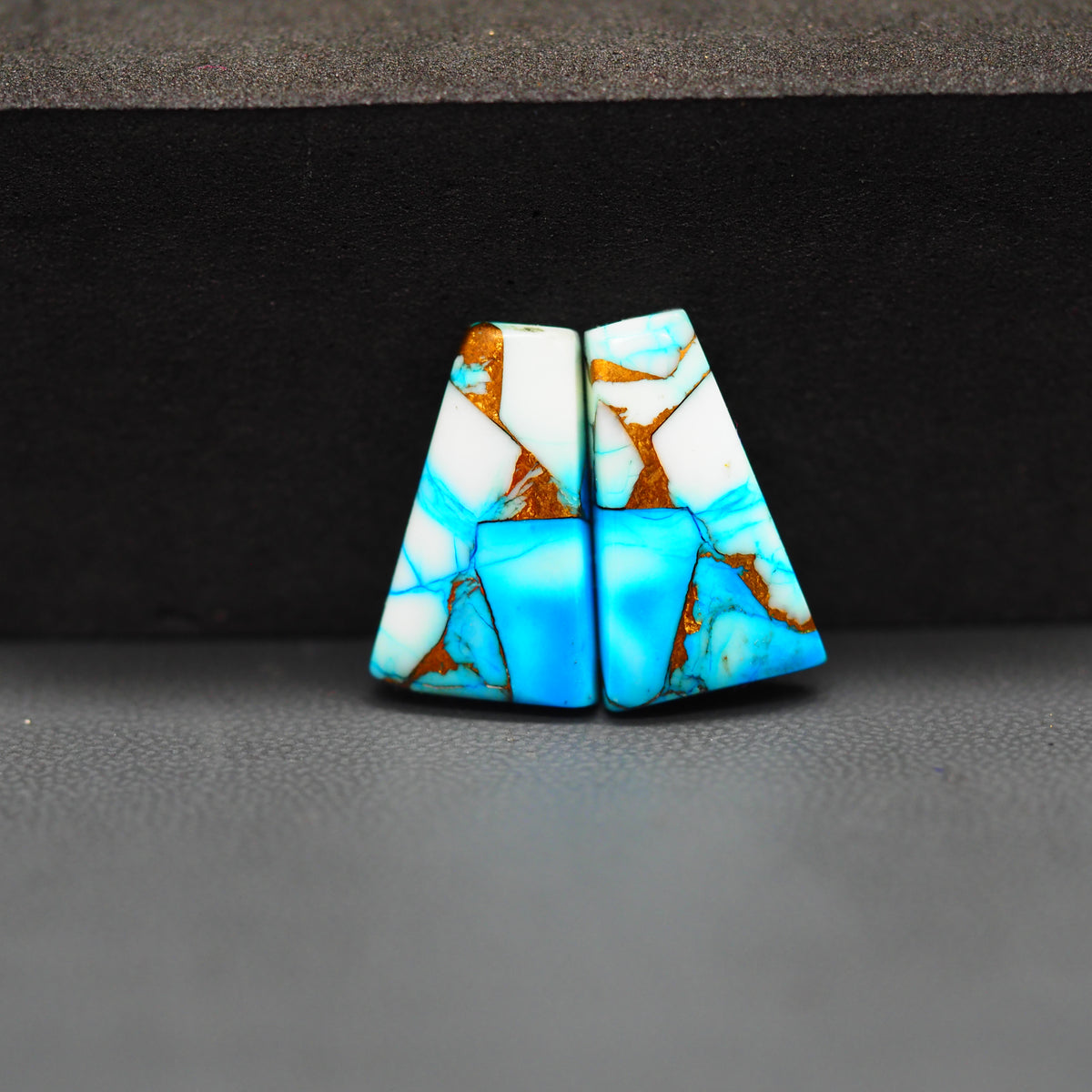 Kingman Ice Blue Dahlia Trapezoid Cabochon Pair 18x11x4mm 13ct - icy blue and white stone with copper veining - Pedra Gems