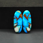 Kingman Ice Blue Dahlia Composite Oval Cabochon Pair 27x10x3mm 18.5ct - icy blue and white stone with copper veining - Pedra Gems