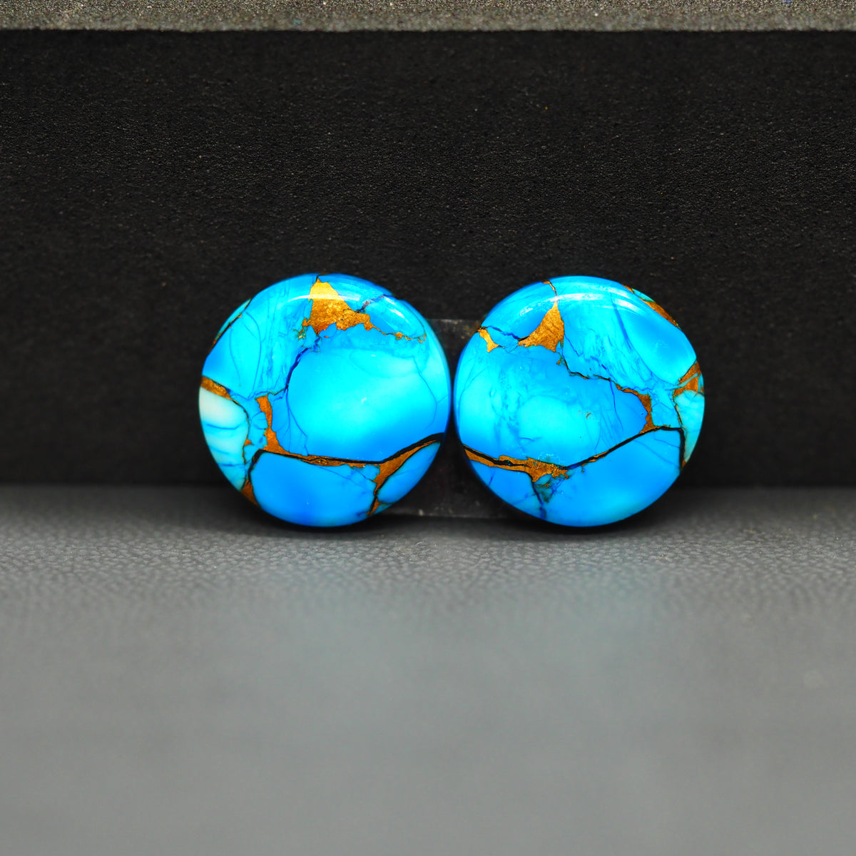 Kingman Ice Blue Dahlia Composite Round Cabochon Pair 15x15x3mm 14ct - icy blue and white stone with copper veining - Pedra Gems