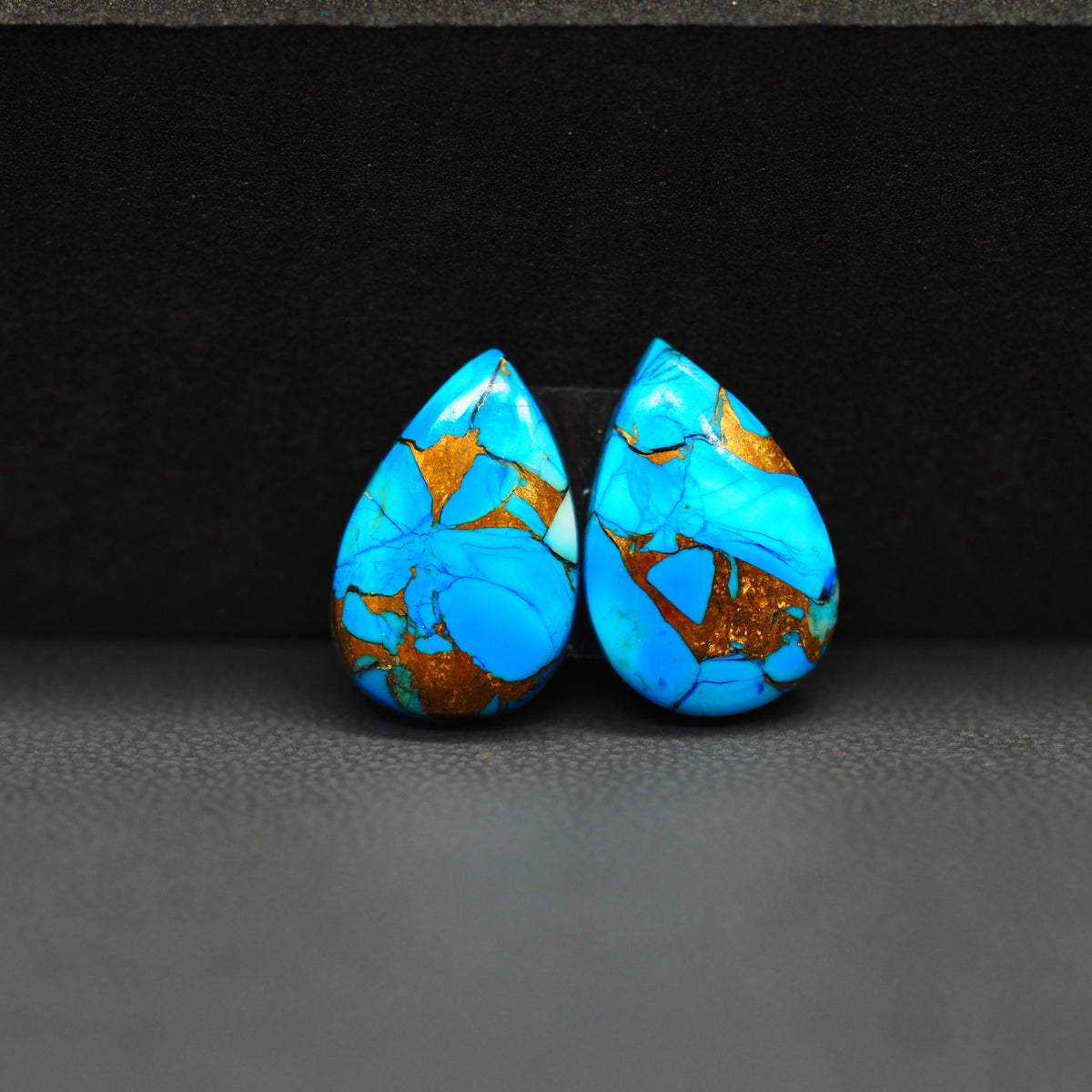 Kingman Ice Blue Dahlia Composite Pear Cabochon Pair 16x12x4mm 10.5ct - icy blue and white stone with copper veining - Pedra Gems
