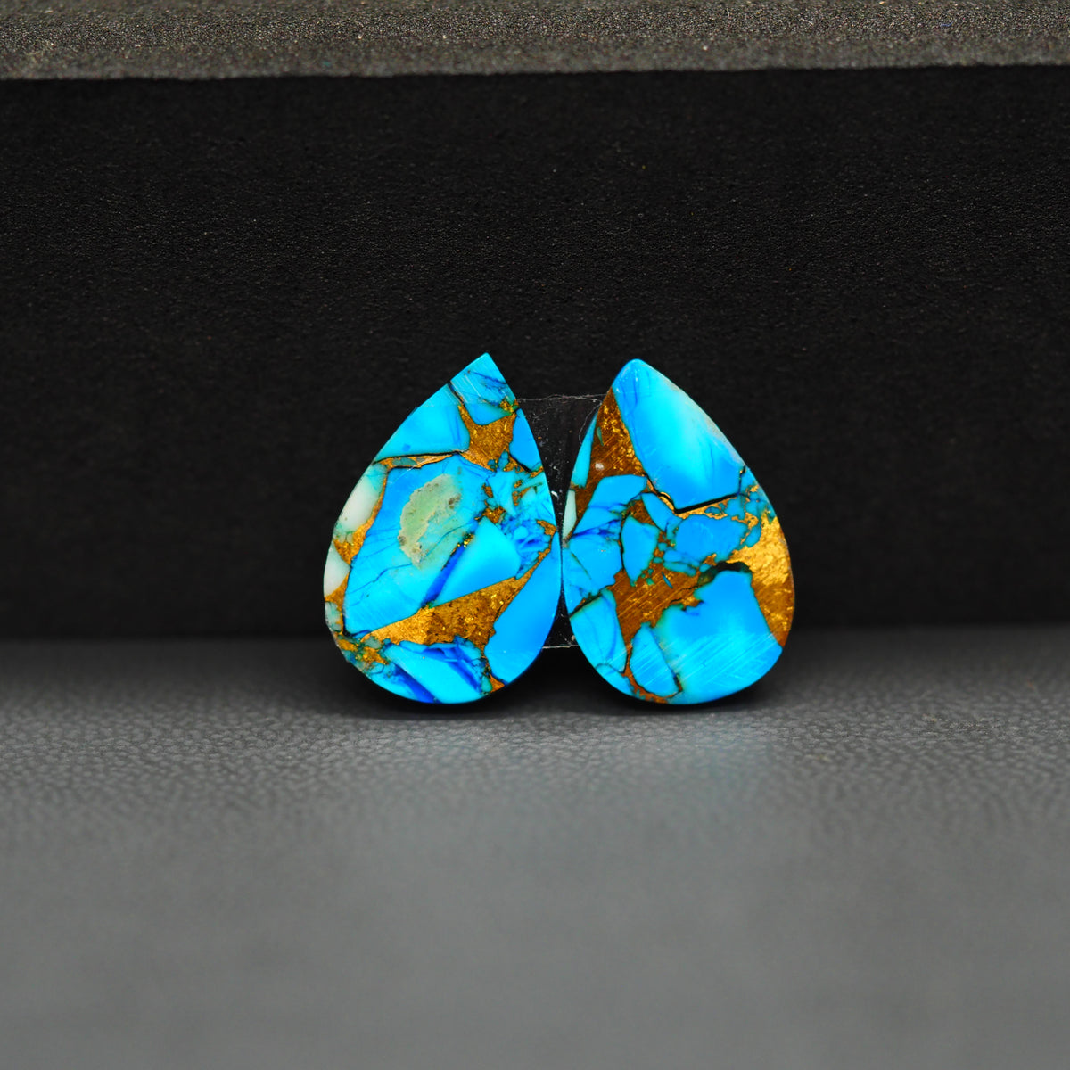 Kingman Ice Blue Dahlia Composite Pear Cabochon Pair 16x12x4mm 10.5ct - icy blue and white stone with copper veining - Pedra Gems