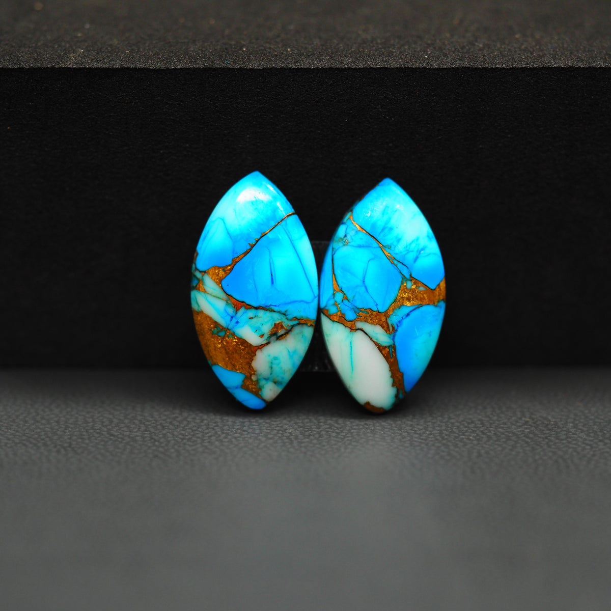 Kingman Ice Blue Dahlia Composite Marquise Cabochon Pair 21x10x3mm 14.5ct - icy blue and white stone with copper veining - Pedra Gems