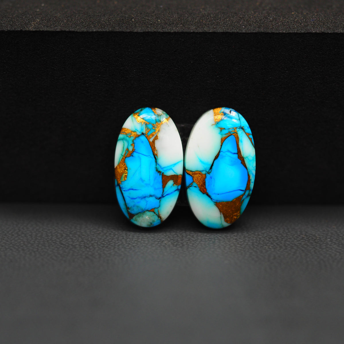Kingman Ice Blue Dahlia Composite Oval Cabochon Pair 18x11x3mm 12.5ct - icy blue and white stone with copper veining - Pedra Gems
