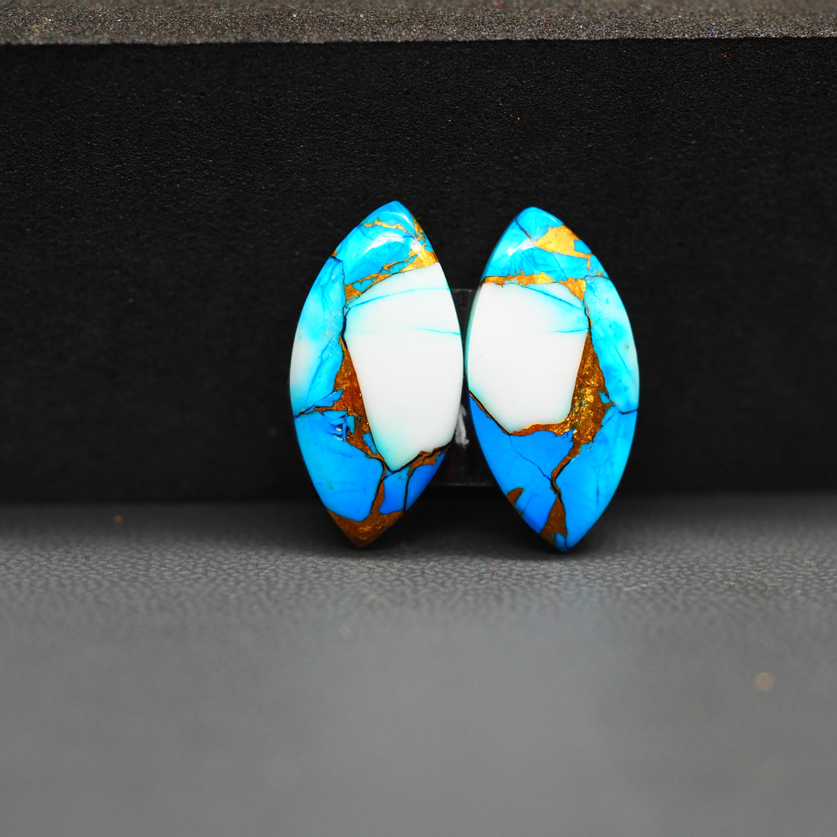 Kingman Ice Blue Dahlia Composite Marquise Cabochon Pair 20x10x3mm 11.5ct - icy blue and white stone with copper veining - Pedra Gems