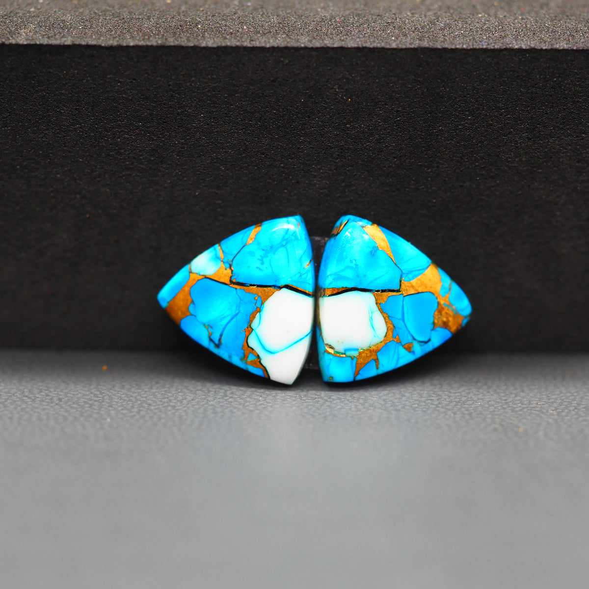 Kingman Ice Blue Dahlia Composite Trillion Cabochon Pair 14x14x3mm 12ct - icy blue and white stone with copper veining - Pedra Gems