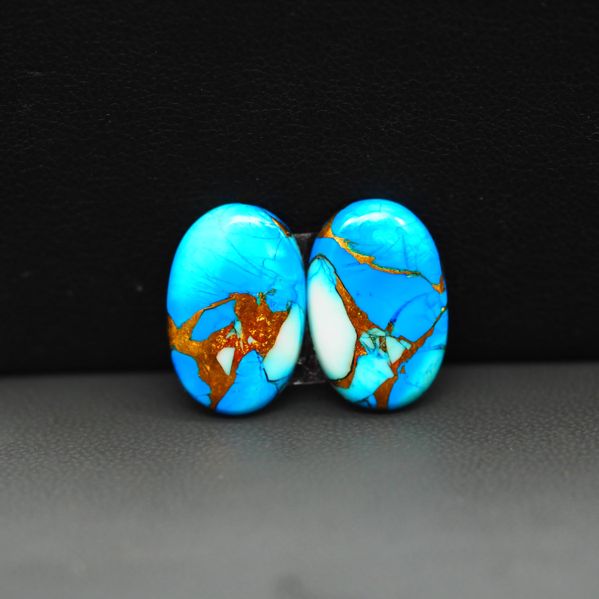 Kingman Ice Blue Dahlia Composite Oval Cabochon Pair 16x11x3mm 10.5ct - icy blue and white stone with copper veining - Pedra Gems