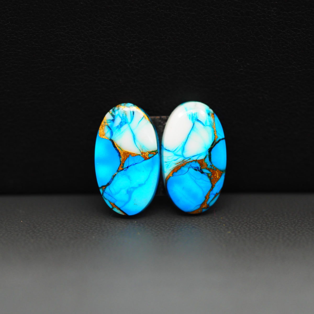 Kingman Ice Blue Dahlia Composite Oval Cabochon Pair 17x10x3mm 11.5ct - icy blue and white stone with copper veining - Pedra Gems